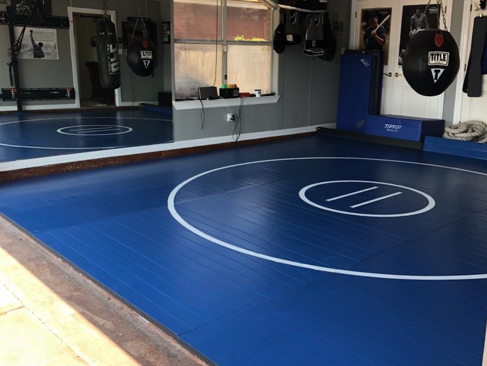 Home wrestling room with floor mats