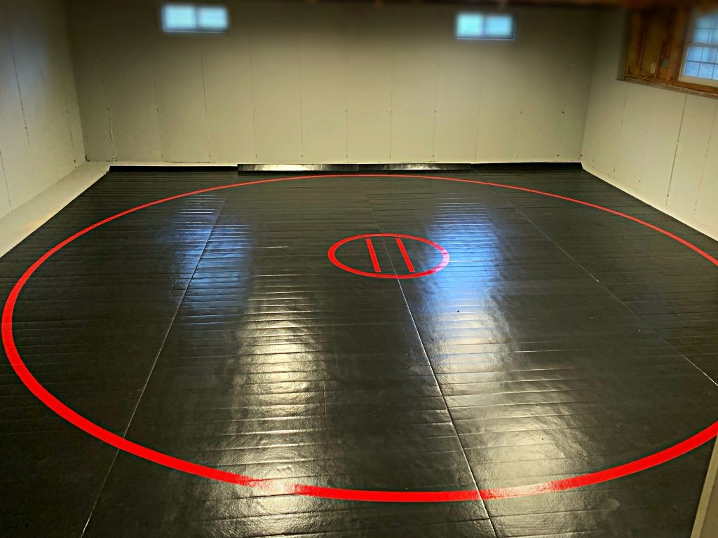 Home War Room, black wrestling mat 