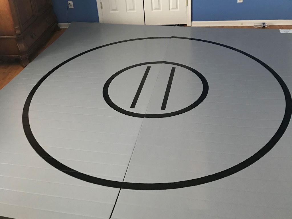 grey home wrestling mat