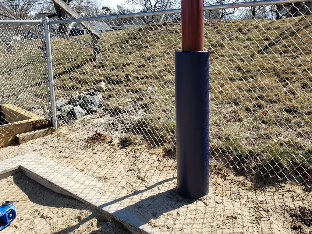 Outdoor playground pole pad